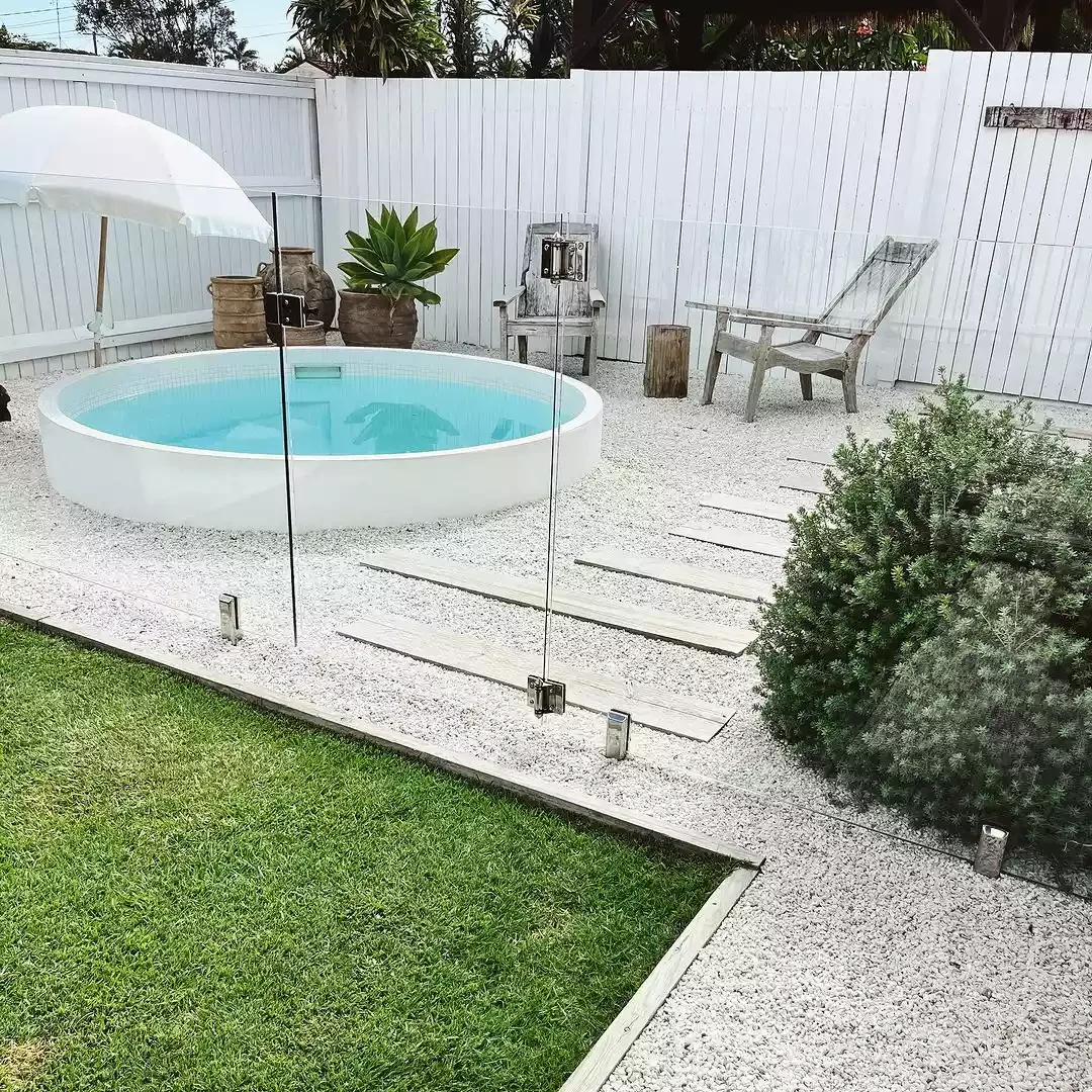 A Pool With a Budget-Friendly Patio