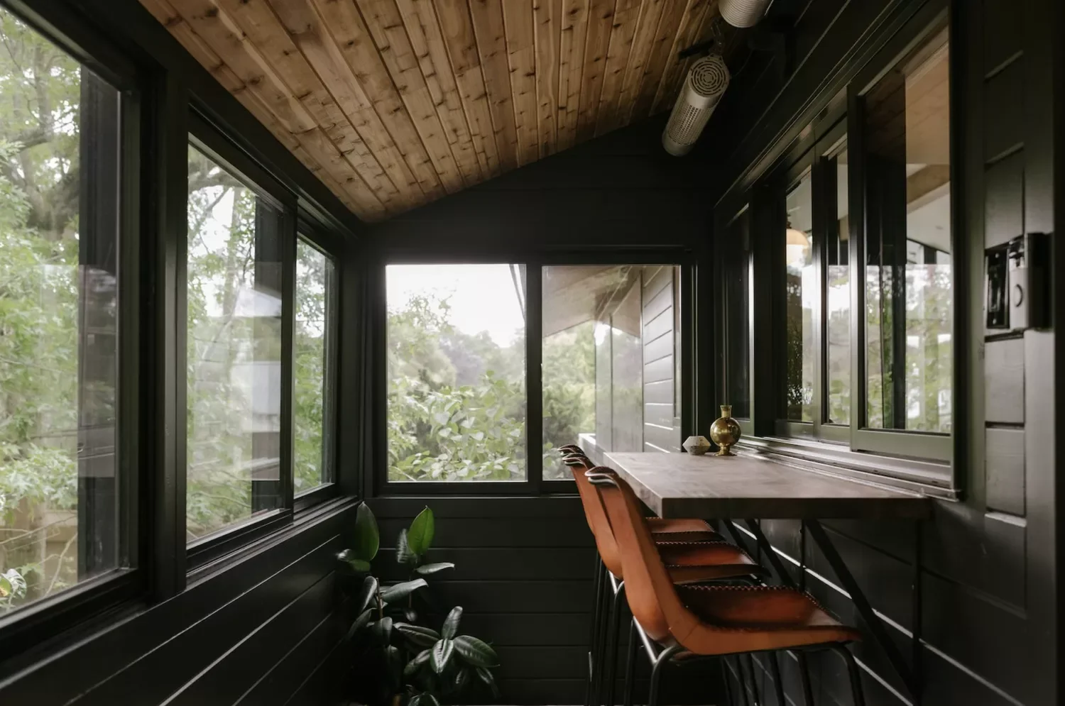 Dark and Moody Sunroom