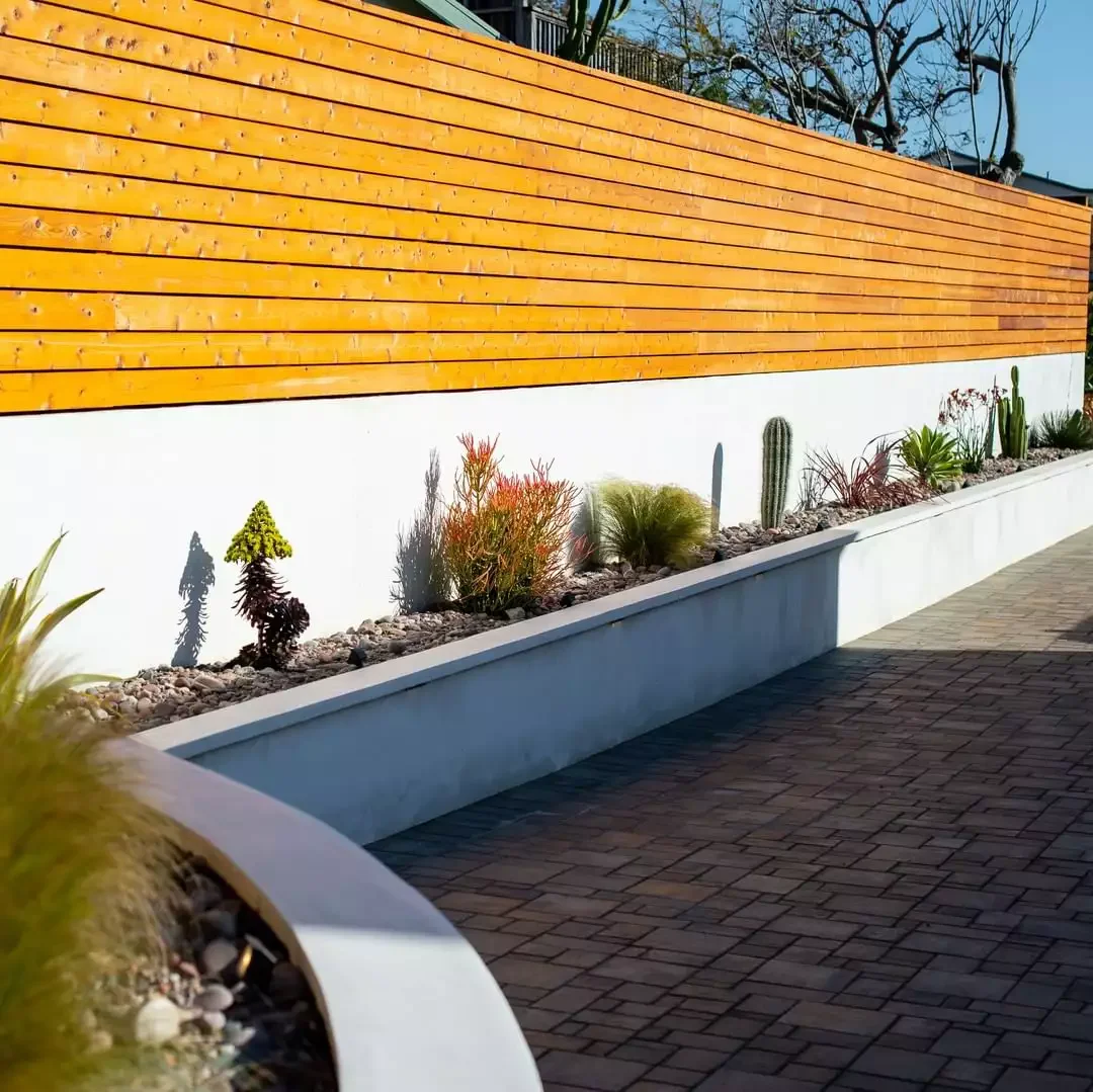 Fence Above Concrete Garden Bed