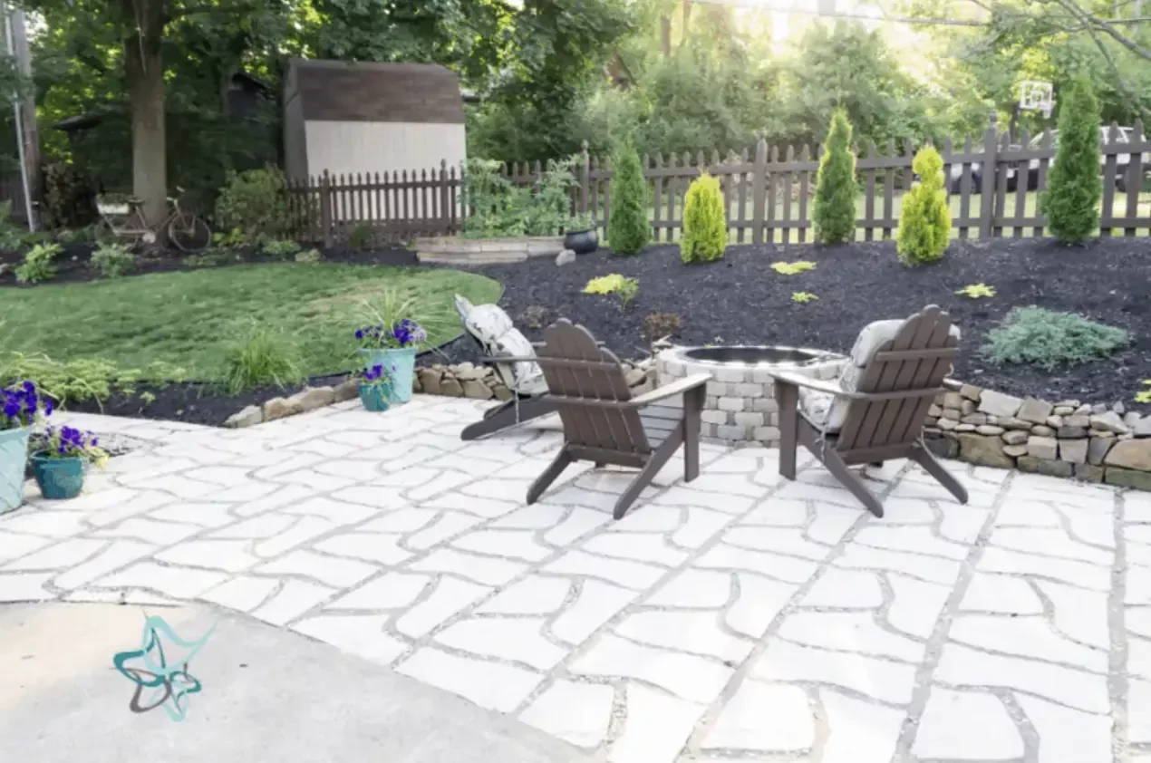 Patio Extension With Wavy Pavers and Gravel