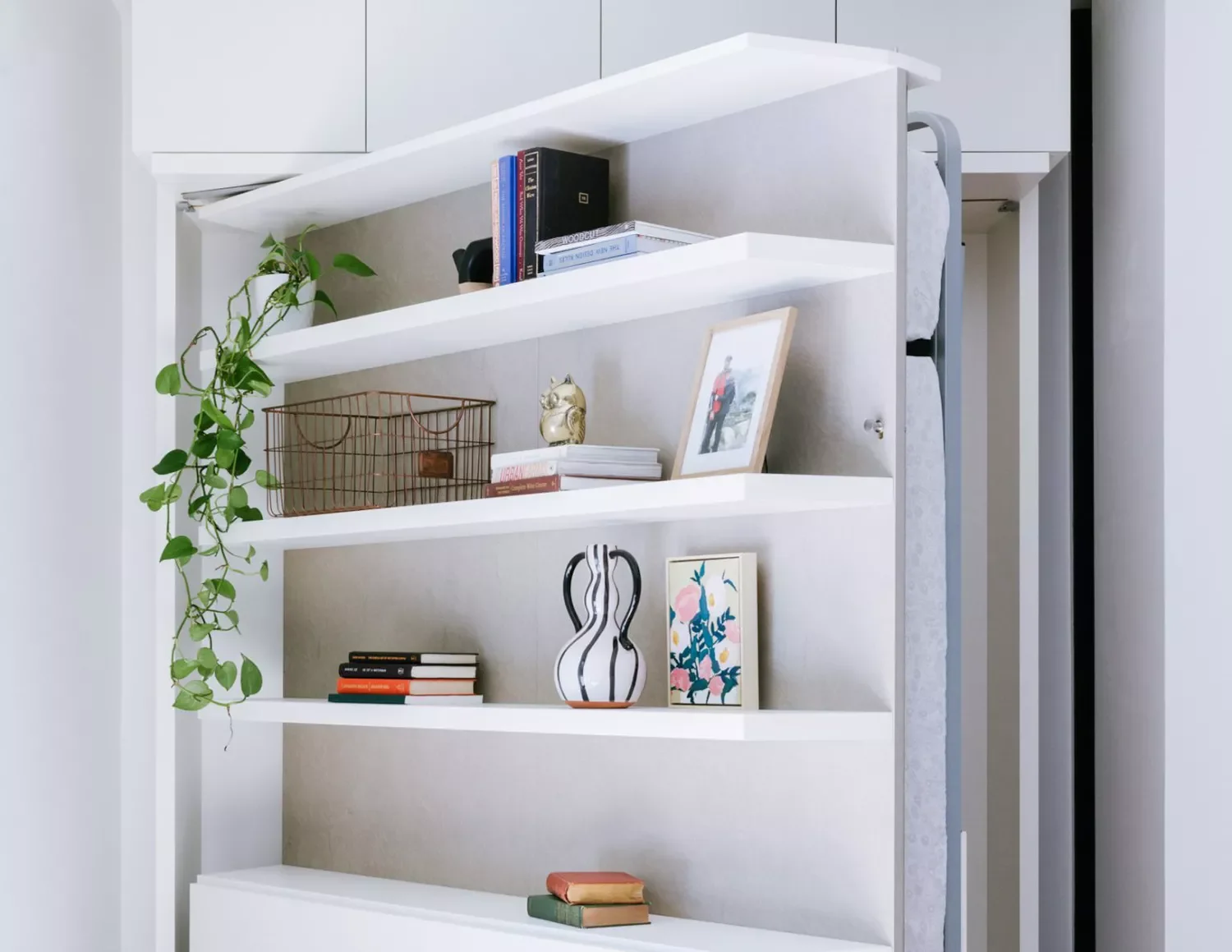 Rotating Bookshelf Murphy Bed