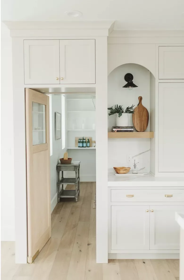 White and Gold Kitchen With Beverage Bar