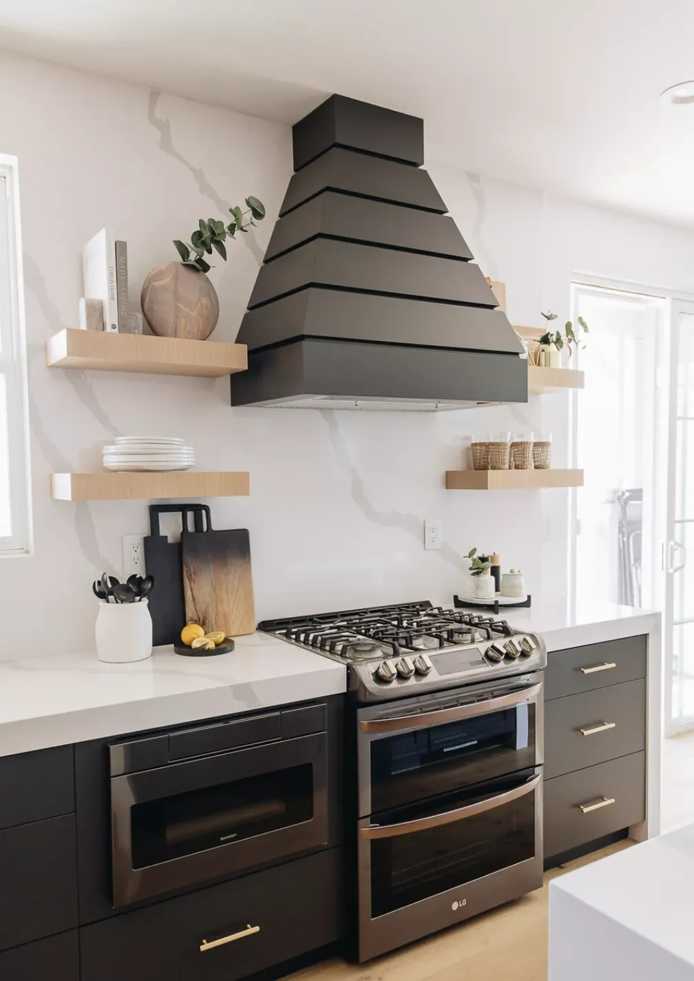 White and Gold Kitchen With Range Hood